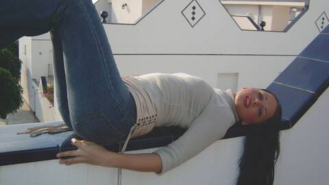 Pornstar teen brunette Kristina stripping on the terrace 