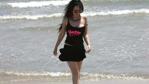 Pornstar brunette with big tits Ana Martin doing a strip by the sea  photo 4