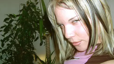 Teen blonde stripping naked on a sofa photo 4