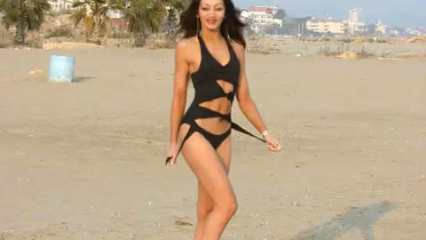 Lovely brunette Angelina dancing and stripping  photo 4