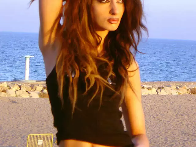 Nice young arab brunette Angelina dancing and stripping  photo 4