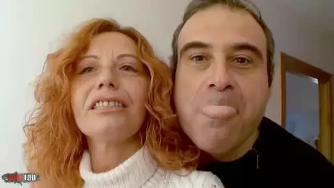 Nice MILF redhead Ann Lorca removing clothes in the stairs  photo 01