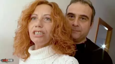 Nice MILF redhead Ann Lorca removing clothes in the stairs  photo 02