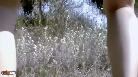 Anna peeing in the woods photo 08