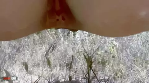 Anna peeing in the woods photo 09