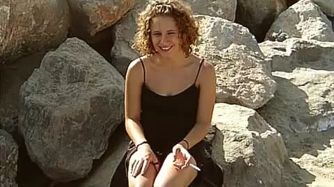 Lovely teen Anna doing a hot striptease in the rocks  photo 5