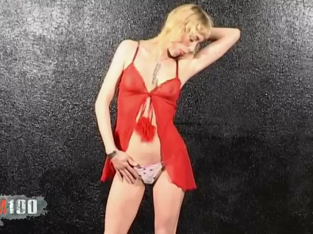 Pretty blonde Aude stripping in the garage  photo 1