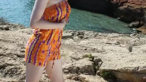 Nice redhead Aurora Viper stripping in the rocks  photo 1