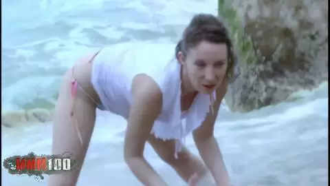 French beauty Ava Blue strips at the beach photo 04