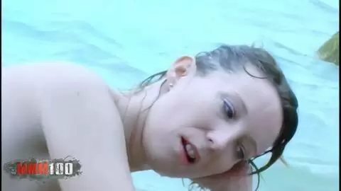 French beauty Ava Blue strips at the beach photo 16