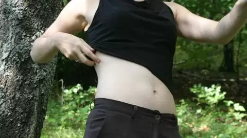 Small tits babe nude in the forest photo 2