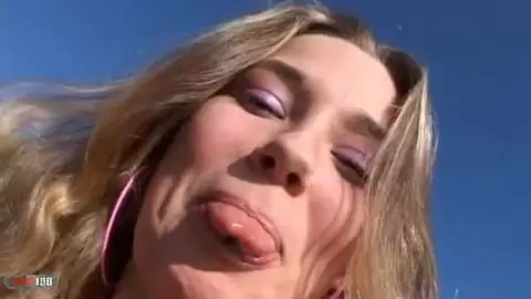 Pretty petite blonde with big boobs Calia B removing clothes by the sea  photo 02