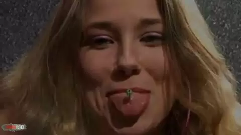 Hot young blonde with big tits Calia B doing a strip in the garage  photo 16