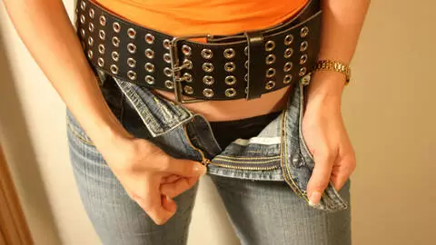 Horny young blonde with big tits Calia B stripping in the stairs  photo 7