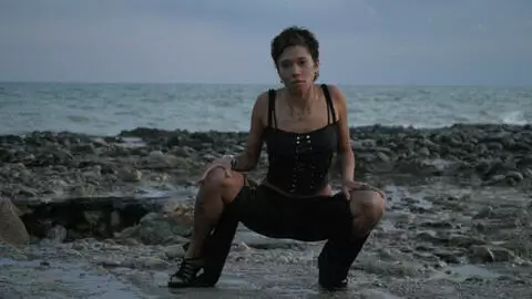 Hot brunette Canele stripping on the beach  photo 14