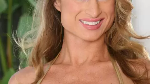 MILF blonde actrice removing her clothes 