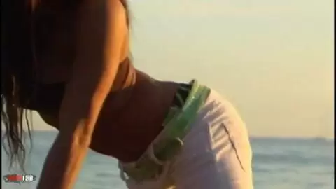 Pretty with big tits Christine doing a strip on the beach  photo 03