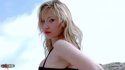 Pretty blond babe exhibits at the beach photo 3