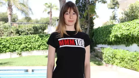 Denise Ahlm poses for pictures with the MMM100 tshirt photo 3