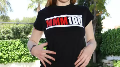Denise Ahlm poses for pictures with the MMM100 tshirt photo 15