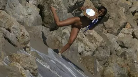 Hot brazilian girl stripping in the beach photo 1