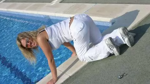 Great blonde with big tits Electra removing clothes at the pool  photo 2