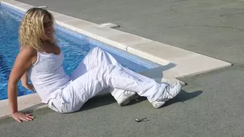 Great blonde with big tits Electra removing clothes at the pool  photo 3