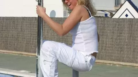 Great blonde with big tits Electra removing clothes at the pool  photo 12