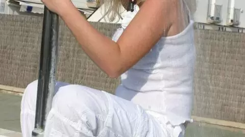 Great blonde with big tits Electra removing clothes at the pool  photo 13