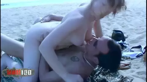 Emy gets fucked on the beach by William photo 04