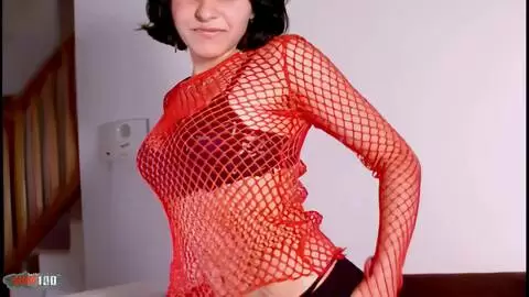 Pretty petite brunette Erika removing clothes on the sofa  photo 02