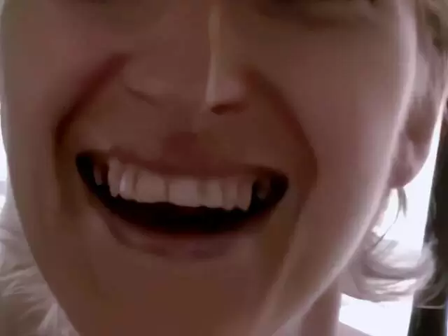 Mature blonde Estelle Clark stripping  photo 1