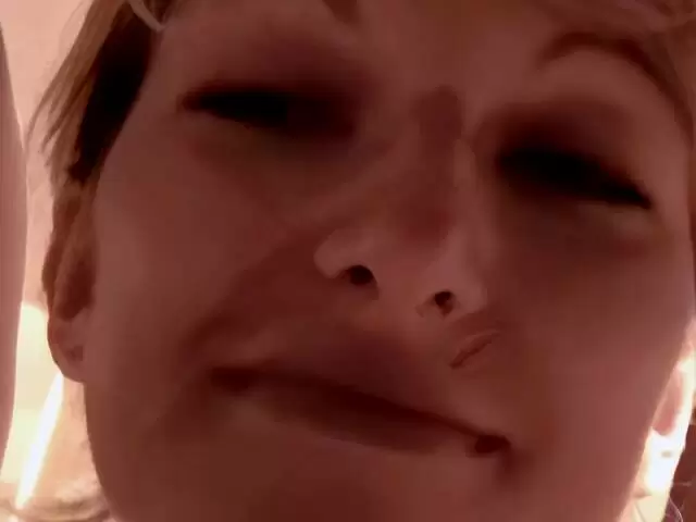 Mature blonde Estelle Clark stripping  photo 2