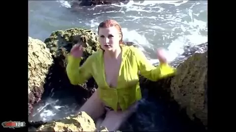 Hot blonde with big tits Eva Ross doing a hot striptease 