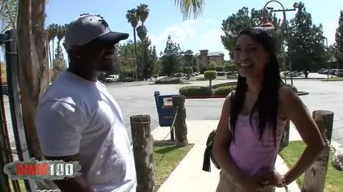 Gorgeous young exotic brunette enjoys a huge black cock in her pussy photo 02