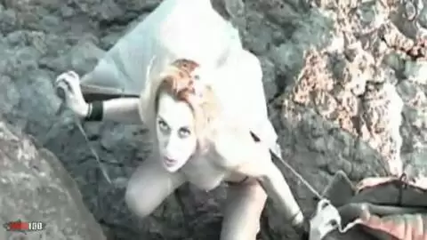 Blonde playing at the beach photo 09