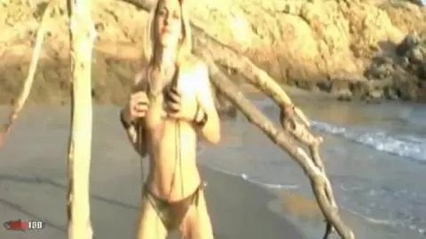 Small blonde geting naked at the beach photo 07