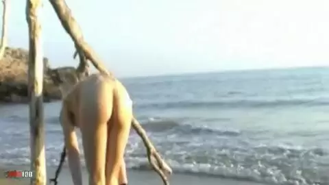 Small blonde geting naked at the beach photo 11