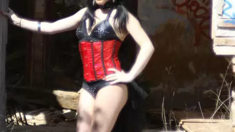 Jordanne Kali in a gorgeous red and black corset