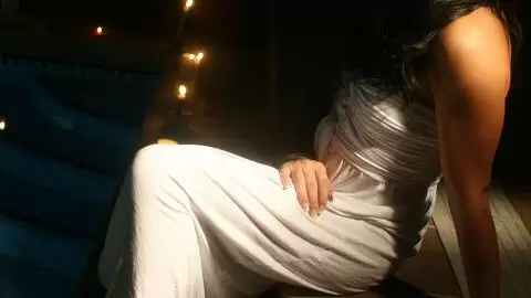 Great teen brunette Jordanne Kali doing a hot striptease by the pool 