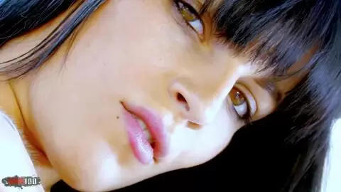 Pornstar petite brunette Jordanne Kali dancing and stripping on the sofa  photo 09