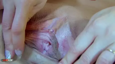 Mature brunette with big boobs Julina Wild stripping on the sofa  photo 16