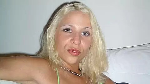 Slutty blonde babe strips and smokes on the sofa photo 6