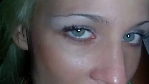 Slutty blonde babe strips and smokes on the sofa photo 12