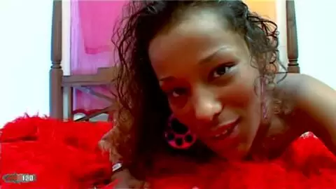 Small black babe touching herself in front of her webcam photo 16