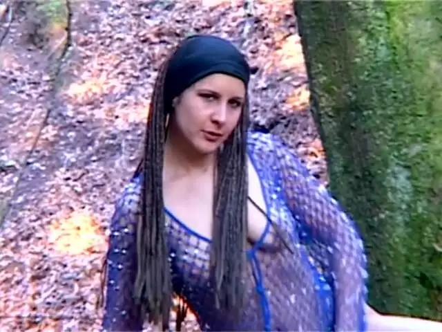 Hot petite brunette Katia stripping in the woods  photo 5