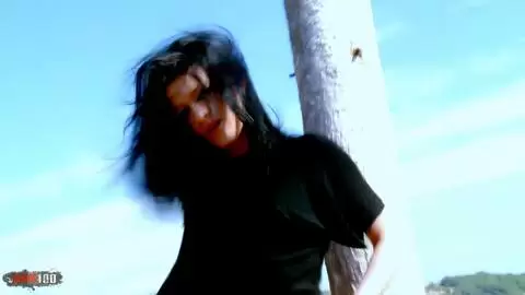 Pornstar teen brunette Lana Fever removing clothes in the rocks  photo 03