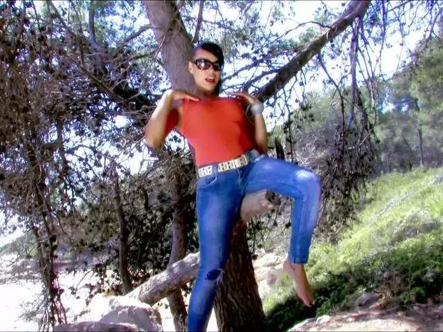 Horny Lara Tinelli removing clothes in the woods  photo 1