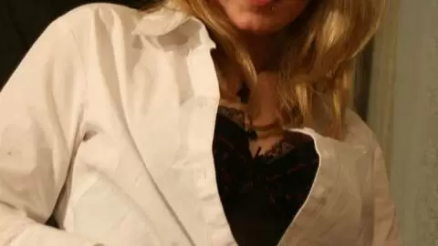 Big tits babe making a strip with some black lingerie photo 2