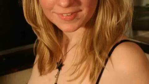 Big tits babe making a strip with some black lingerie photo 7